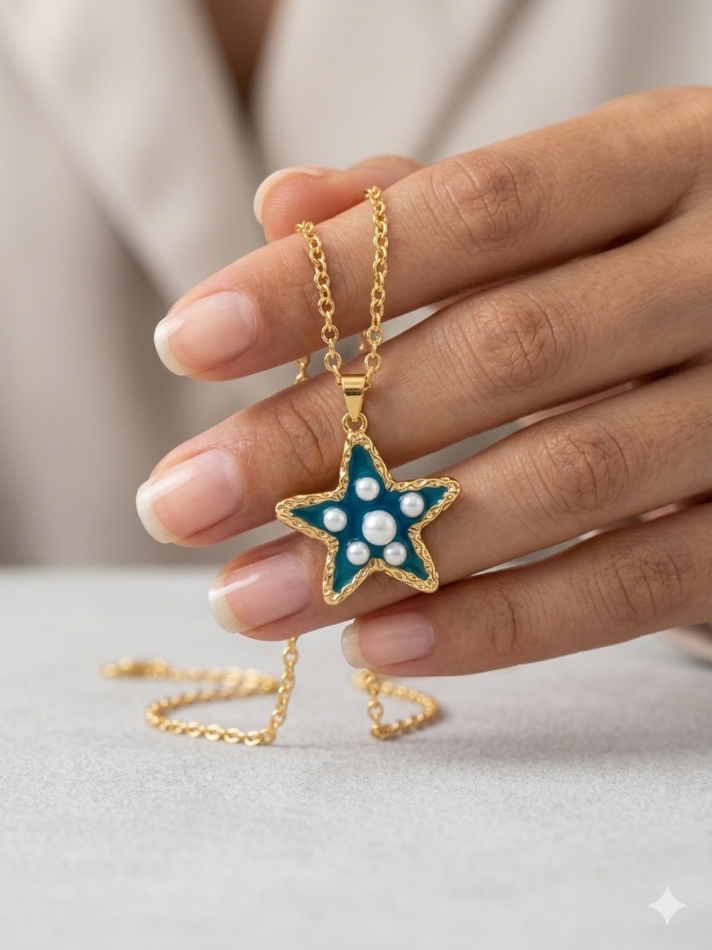 ✨Gold-Tone Star Pendant Necklace with Blue Enamel and Pearl Accents✨